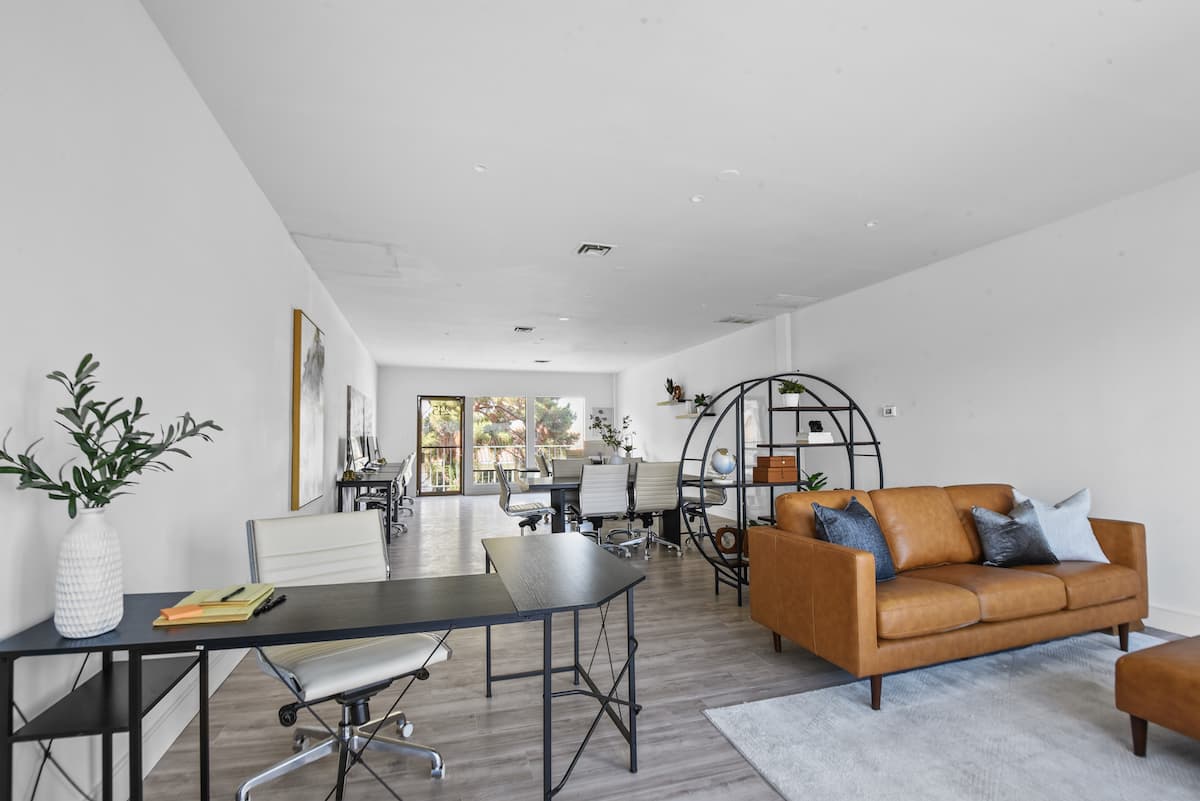 An open-plan office suite with lounge seating